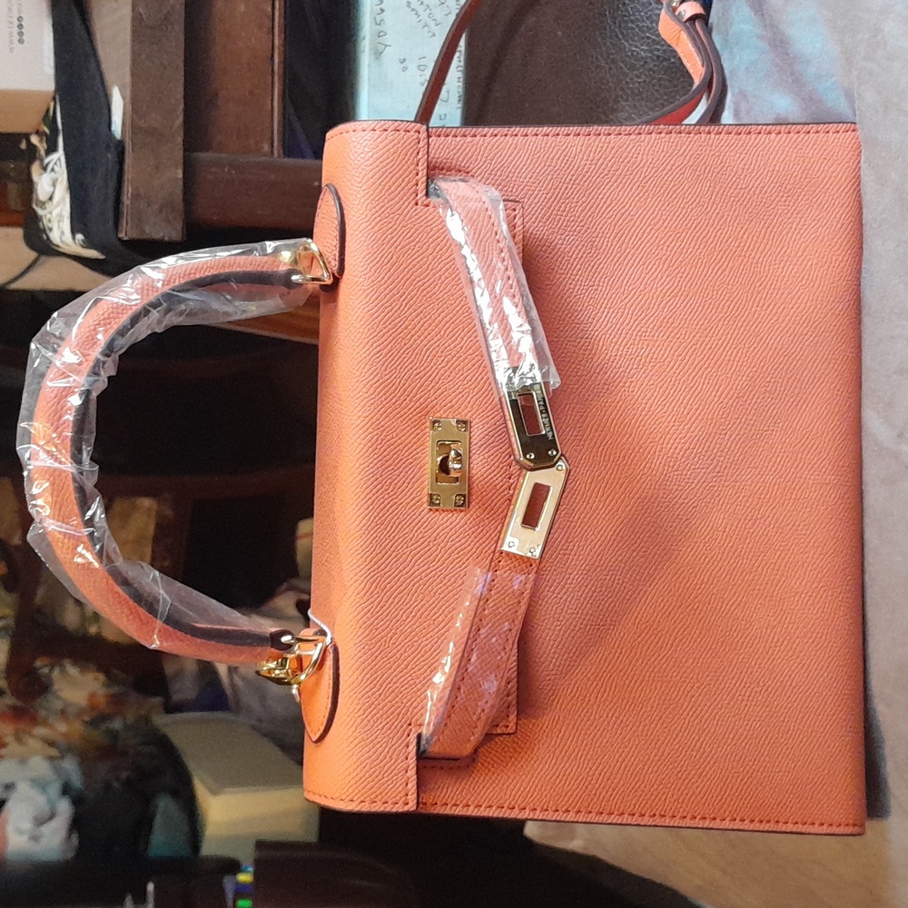 Hermes small orange leather bag # 68A